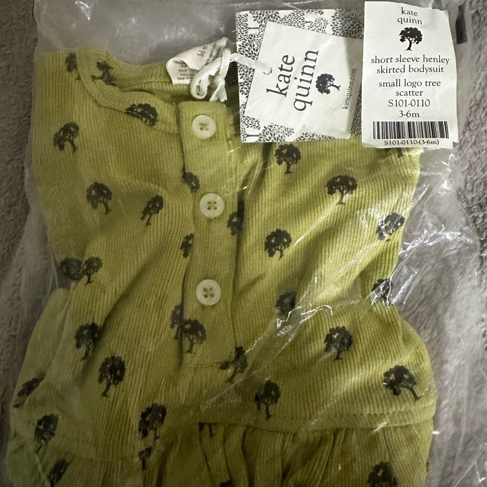 Kate Quinn Henley Skirted Bodysuit NWT